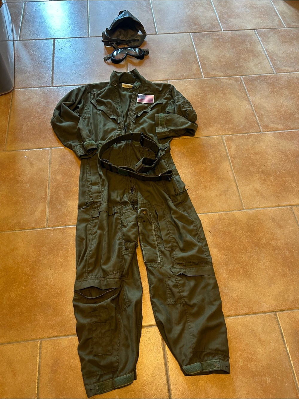 Vintage military flight suit, belt, goggles and cap